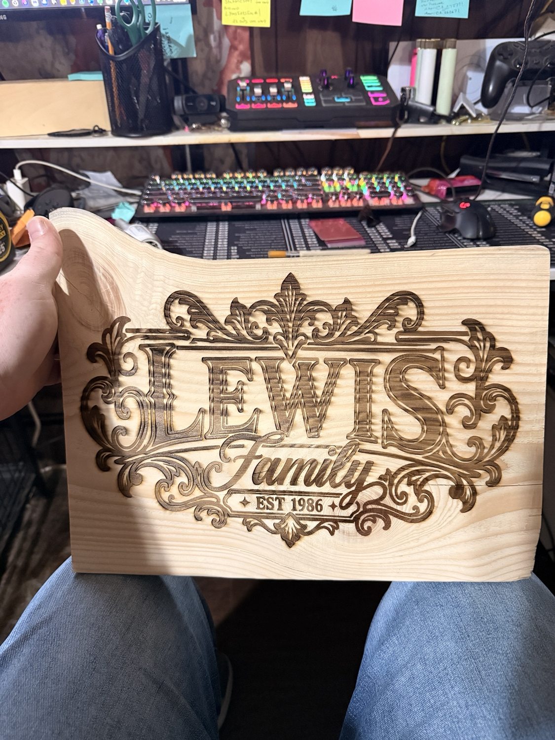 Ornate Lewis Family wooden sign, established 1986