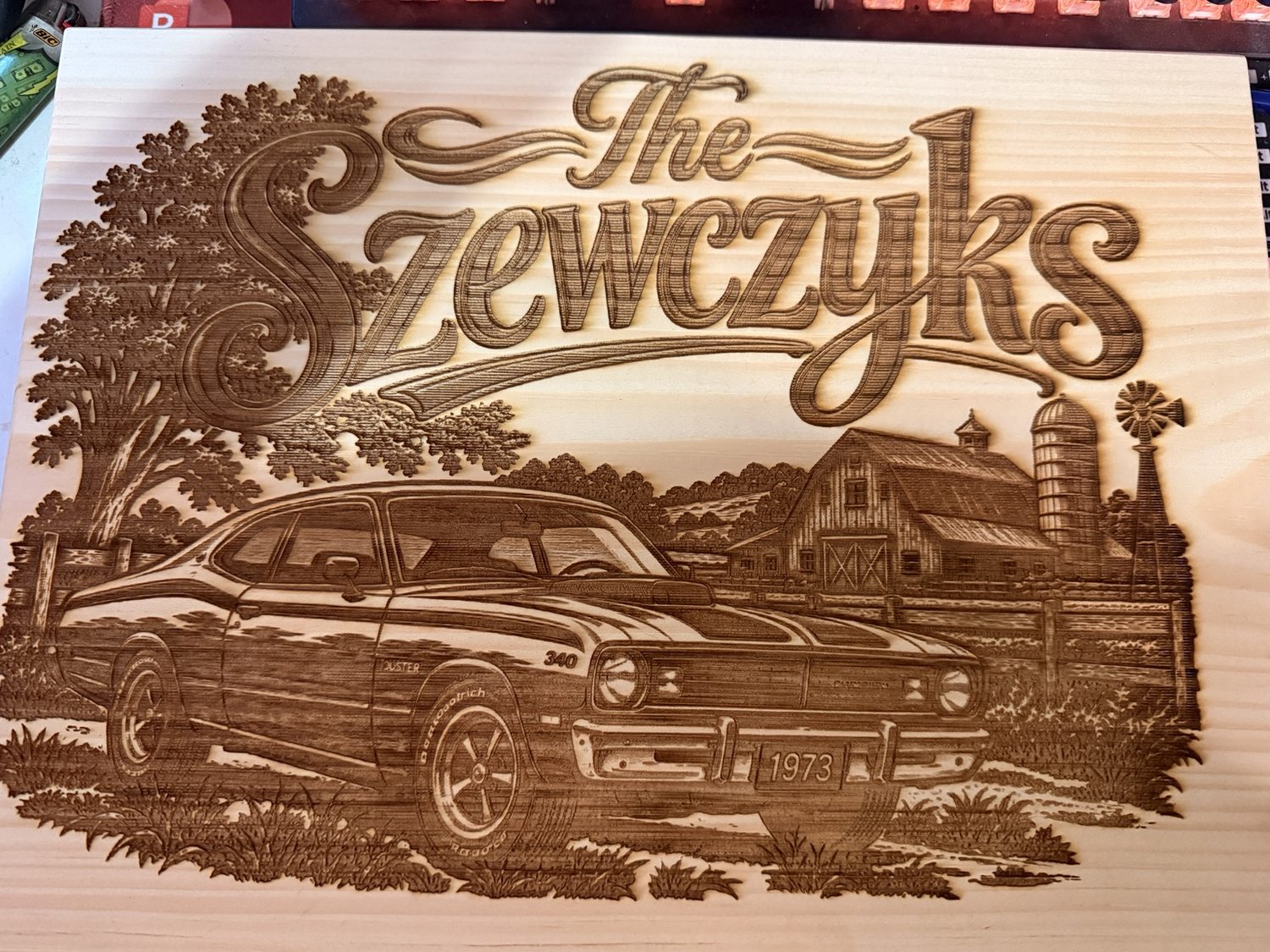 Personalized Szewczyks family sign with a 1973 Plymouth Duster and farm scenery